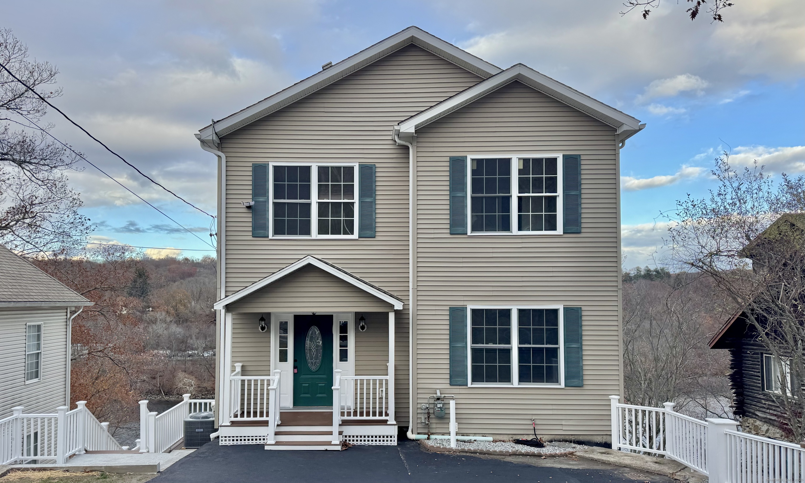 112 River Road Shelton, CT 06484 - Photo 37 of 37 a front view of a house with a yard