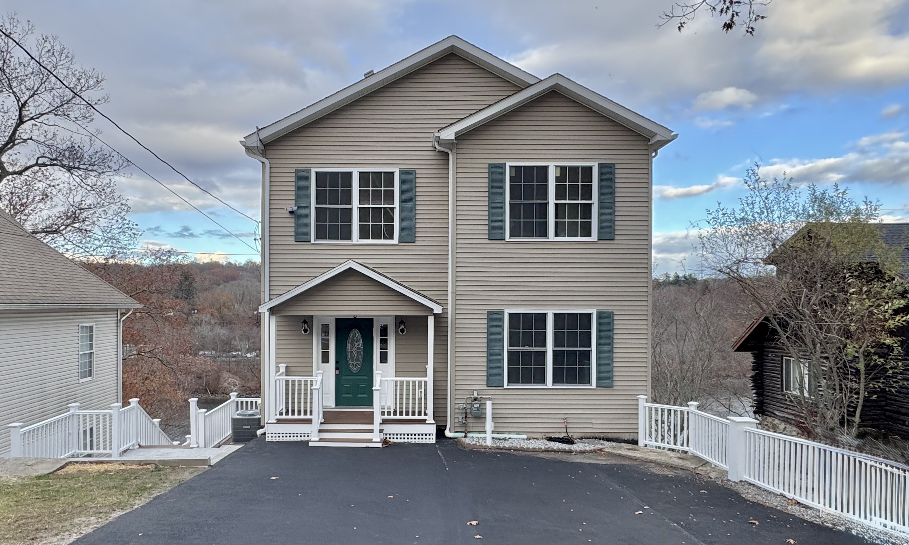 112 River Road Shelton, CT 06484 - Photo 4 of 37 a view of a house with backyard and sitting area