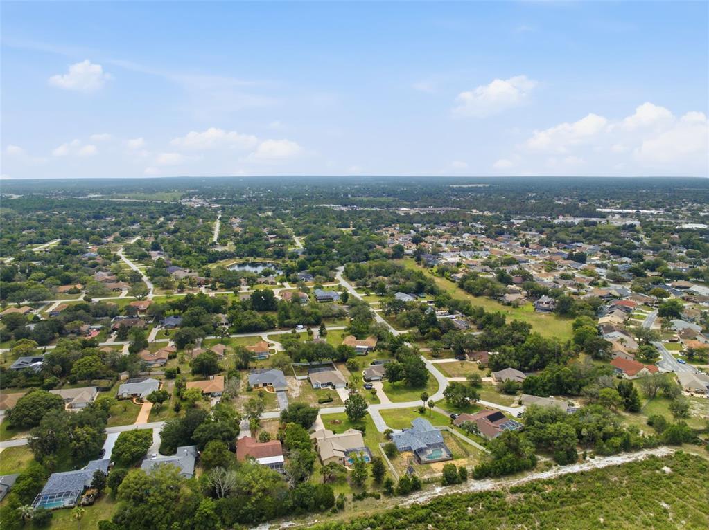 5227 Suwannee Road Weeki Wachee, FL 34607 - Photo 56 of 62 an aerial view of multiple house