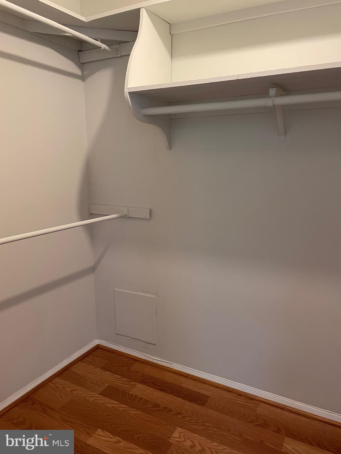 5225 Pooks Hill Road, Unit 228S Bethesda, MD 20814 - Photo 15 of 28 a view of a room with racks on the wall