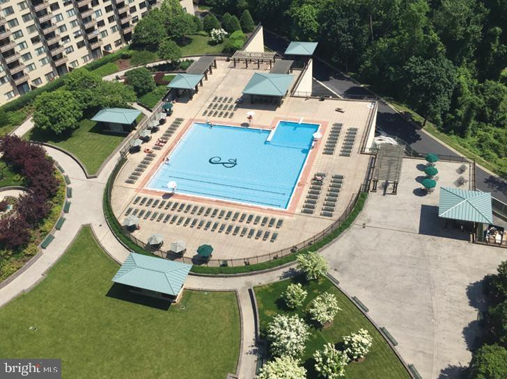 5225 Pooks Hill Road, Unit 228S Bethesda, MD 20814 - Photo 23 of 28 an aerial view of a house with garden space and street view