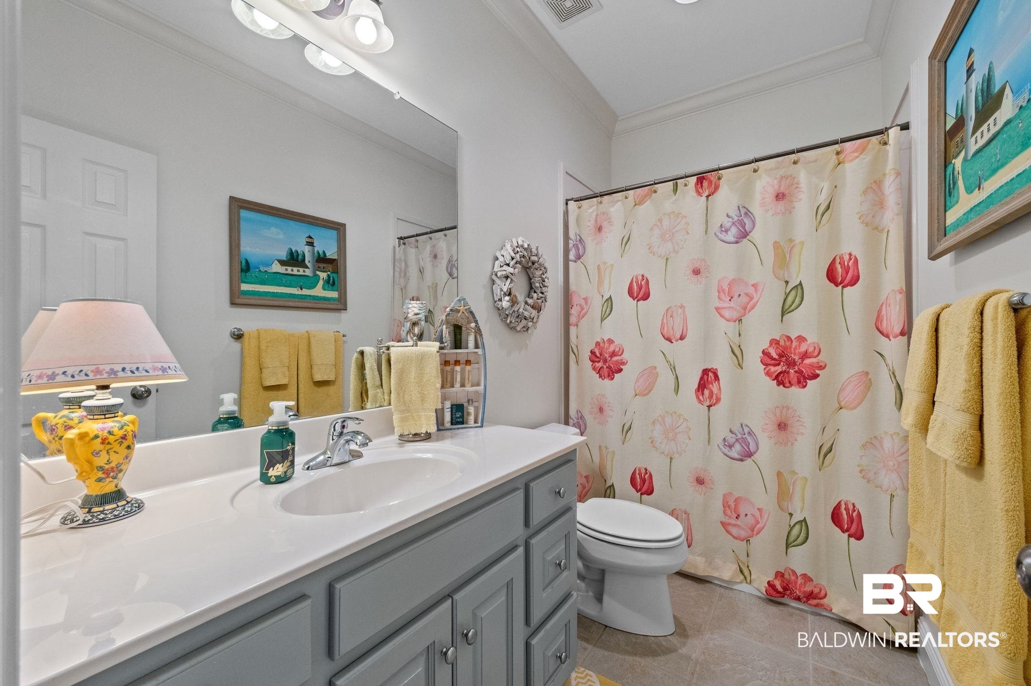 30151 Dolive Ridge Daphne, AL 36527 - Photo 21 of 37 Bathroom with toilet, ornamental molding, a shower with curtain, tile patterned floors, and vanity