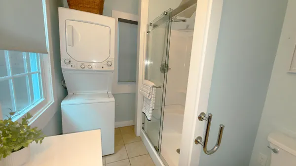 a kitchen with stainless steel appliances granite countertop a stove and a microwave