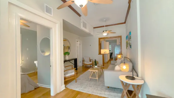 a dining room with table and chairs