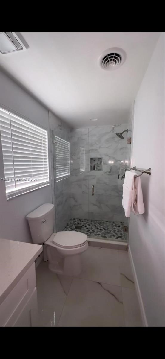 2212 Club House Road North Fort Myers, FL 33917 - Photo 24 of 40 a bathroom with a bathtub sink and toilet