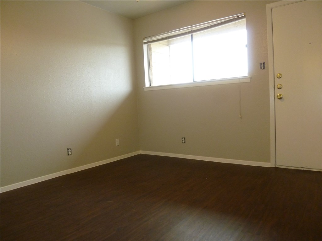 3000 Guadalupe Street, Unit 313 Austin, TX 78705 - Photo 8 of 14 an empty room with a window