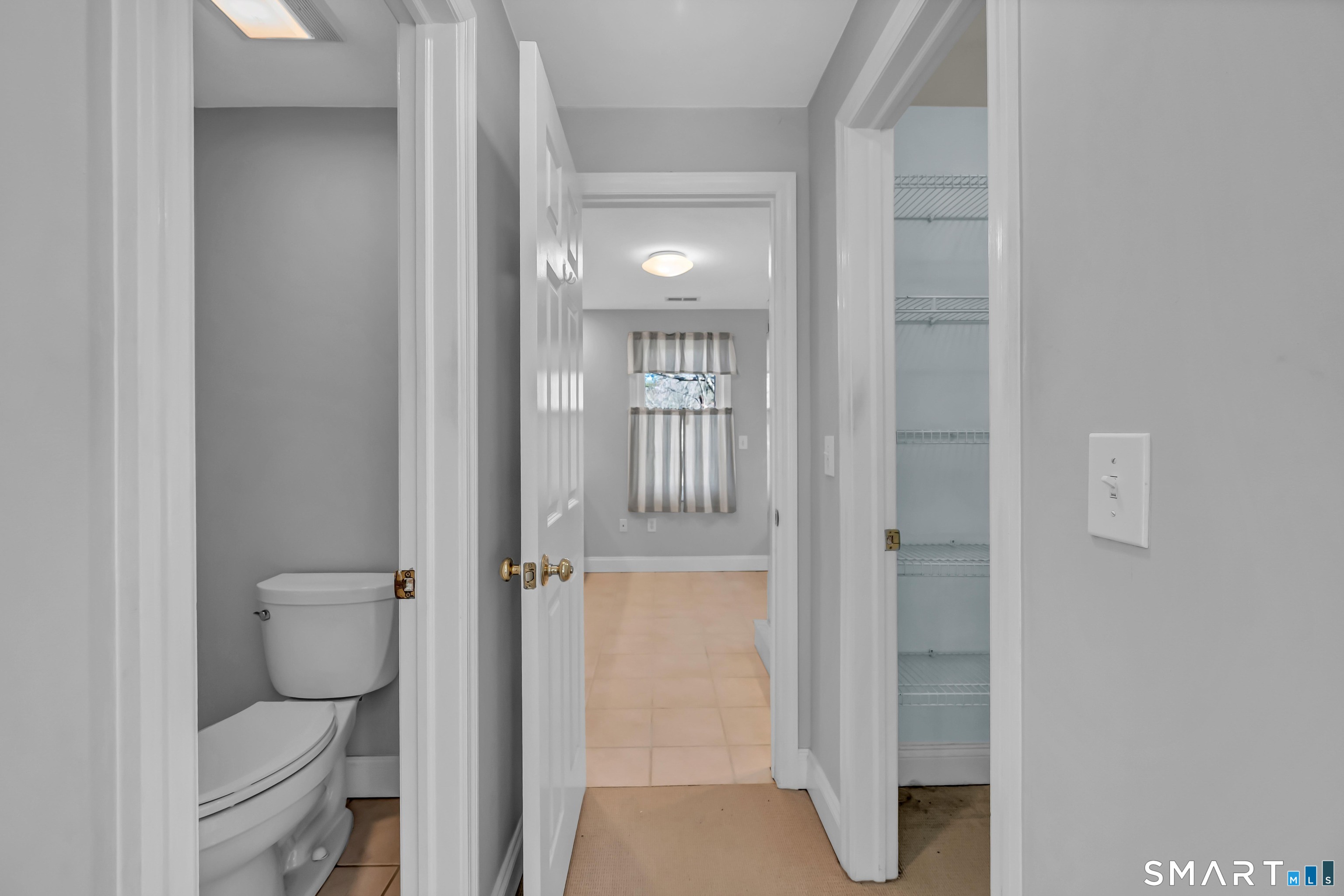 1 Reservoir Road Newtown, CT 06470 - Photo 19 of 37 Primary En Suite Powder Room, Walk-in Closet