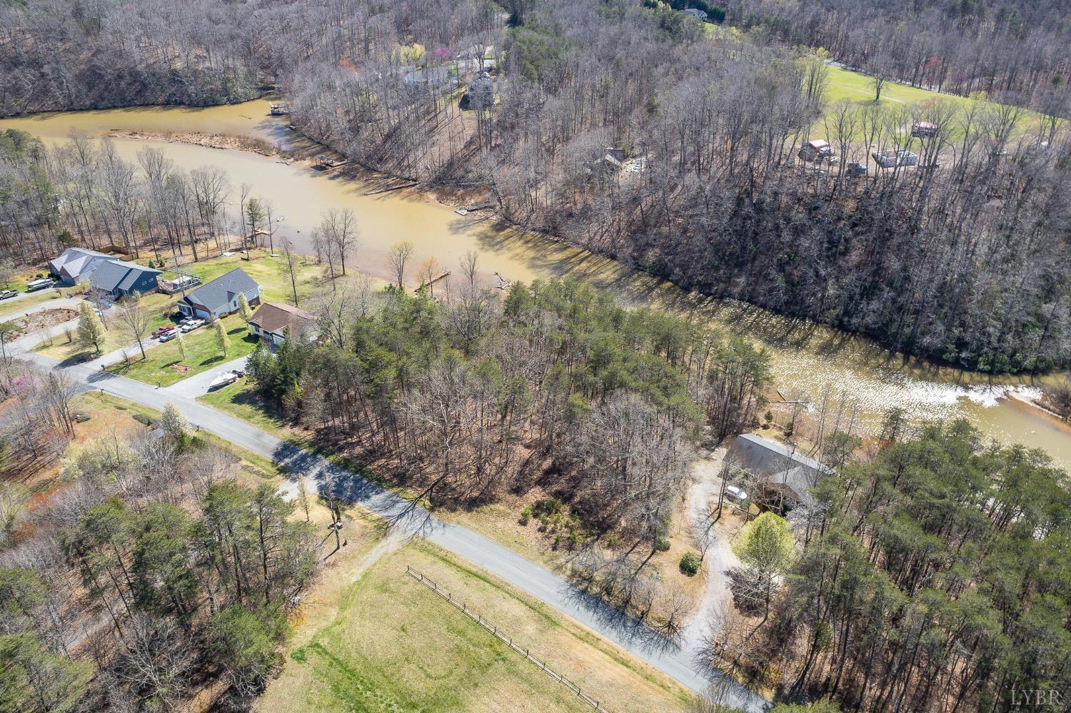 4 Inlet Drive Wirtz, VA 24184 - Photo 7 of 11 a view of a yard with wooden fence