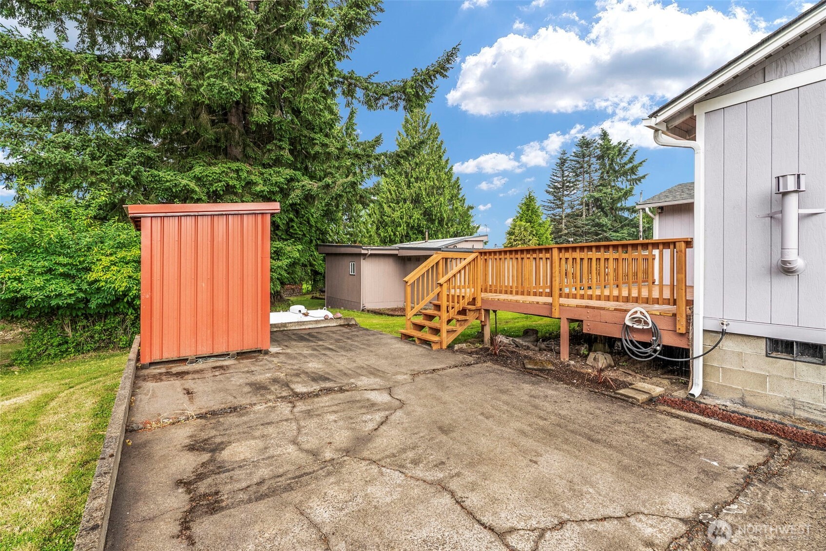 175 Jacobson Road Cathlamet, WA 98612 - Photo 14 of 32 a view of a backyard with a sitting area