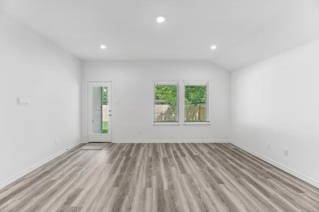 an empty room with window