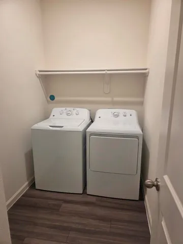 a utility room with dryer and washer