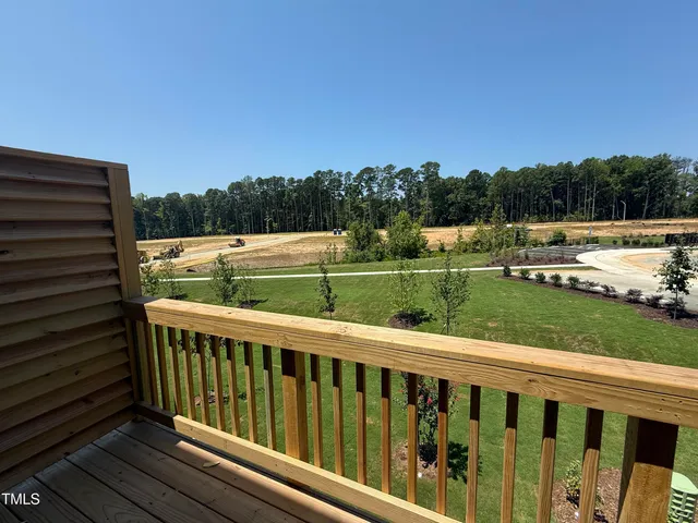 a view of a two chairs in the roof deck