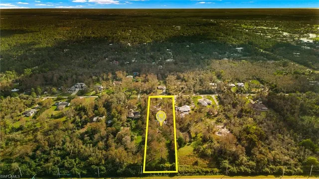 a kitchen with a table and chairs in it
