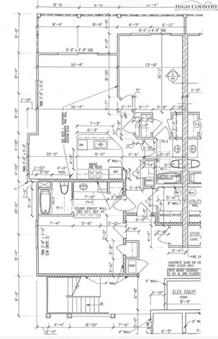 a front view of a house with a garden and sitting area
