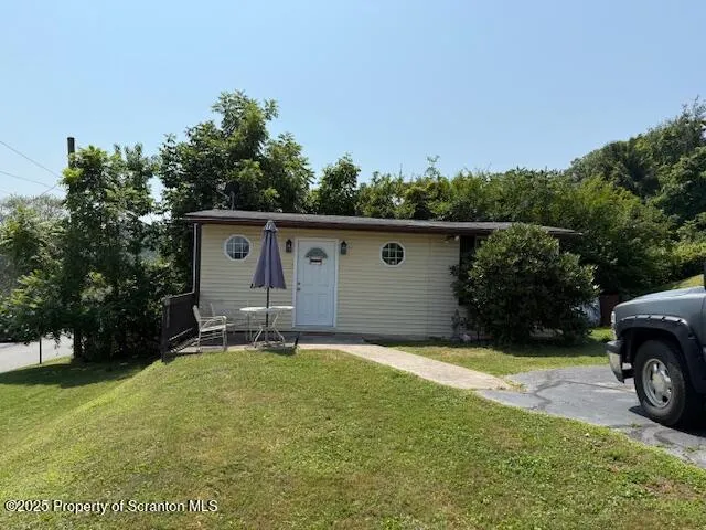a house view with a garden space