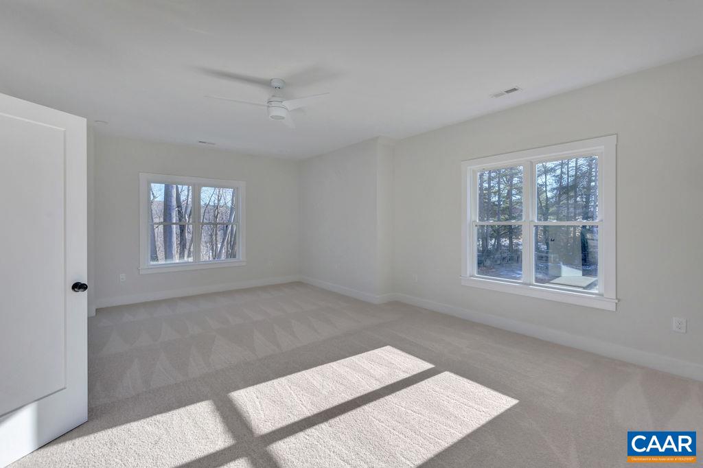 97 Daddy Rabbit Court Ruckersville, VA 22968 - Photo 33 of 48 a view of an empty room with windows
