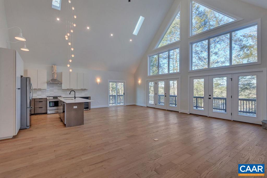 97 Daddy Rabbit Court Ruckersville, VA 22968 - Photo 7 of 48 a view of kitchen with furniture and wooden floor