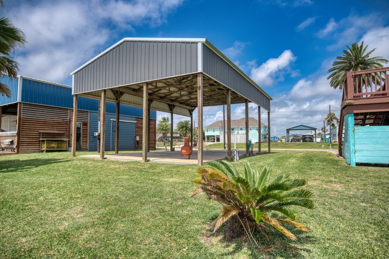 511 County Road 202 Sargent, TX 77414 - Photo 2 of 12 a house view with a garden space