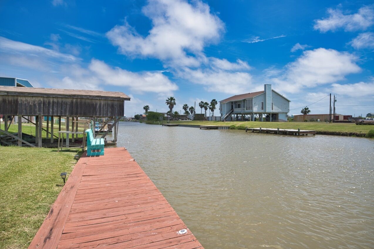 511 County Road 202 Sargent, TX 77414 - Photo 6 of 12 a front view of a house with a lake view