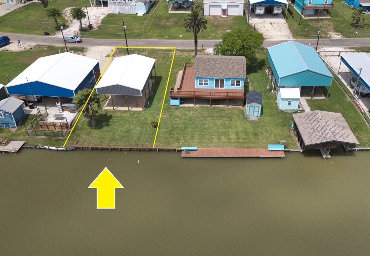 511 County Road 202 Sargent, TX 77414 - Photo 9 of 12 an aerial view of a house with swimming pool and outdoor space