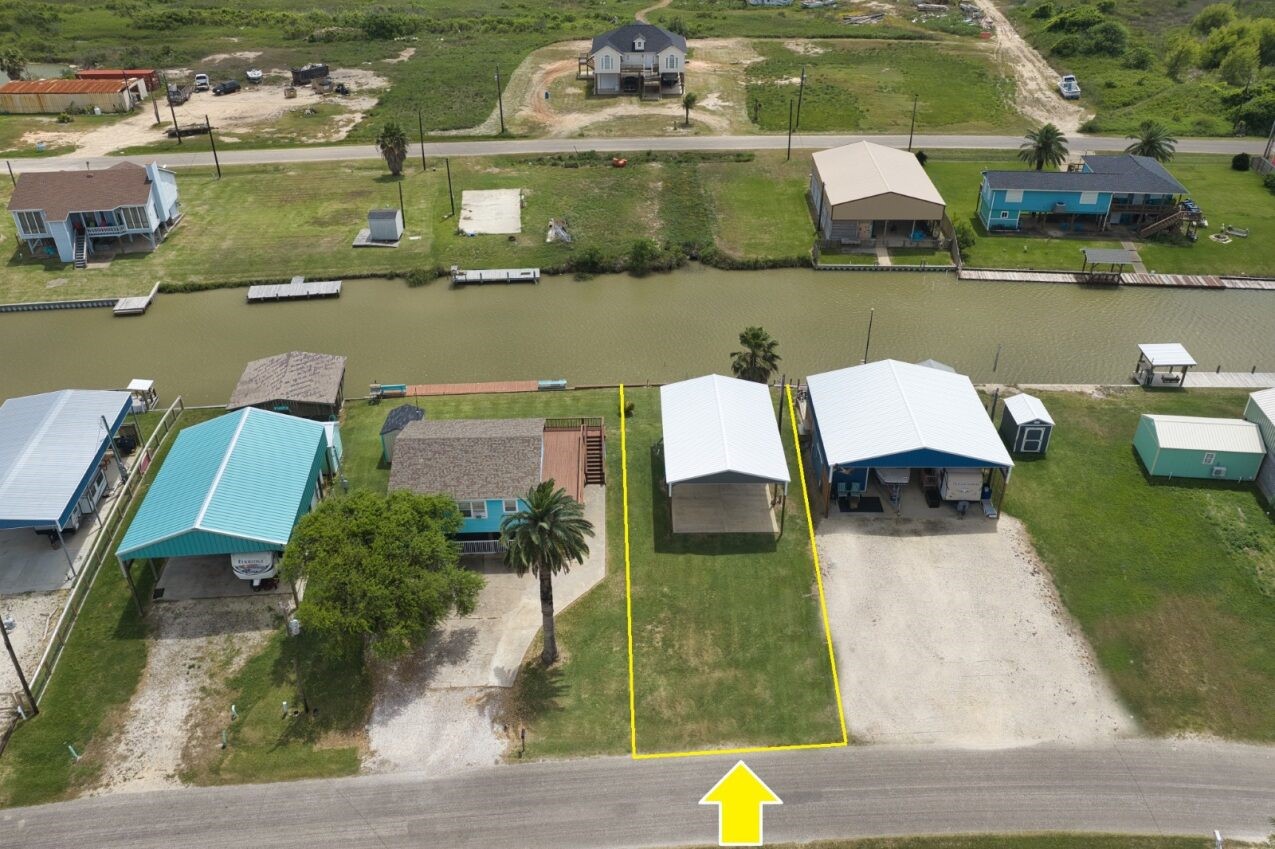 511 County Road 202 Sargent, TX 77414 - Photo 10 of 12 an aerial view of a house with a lake view