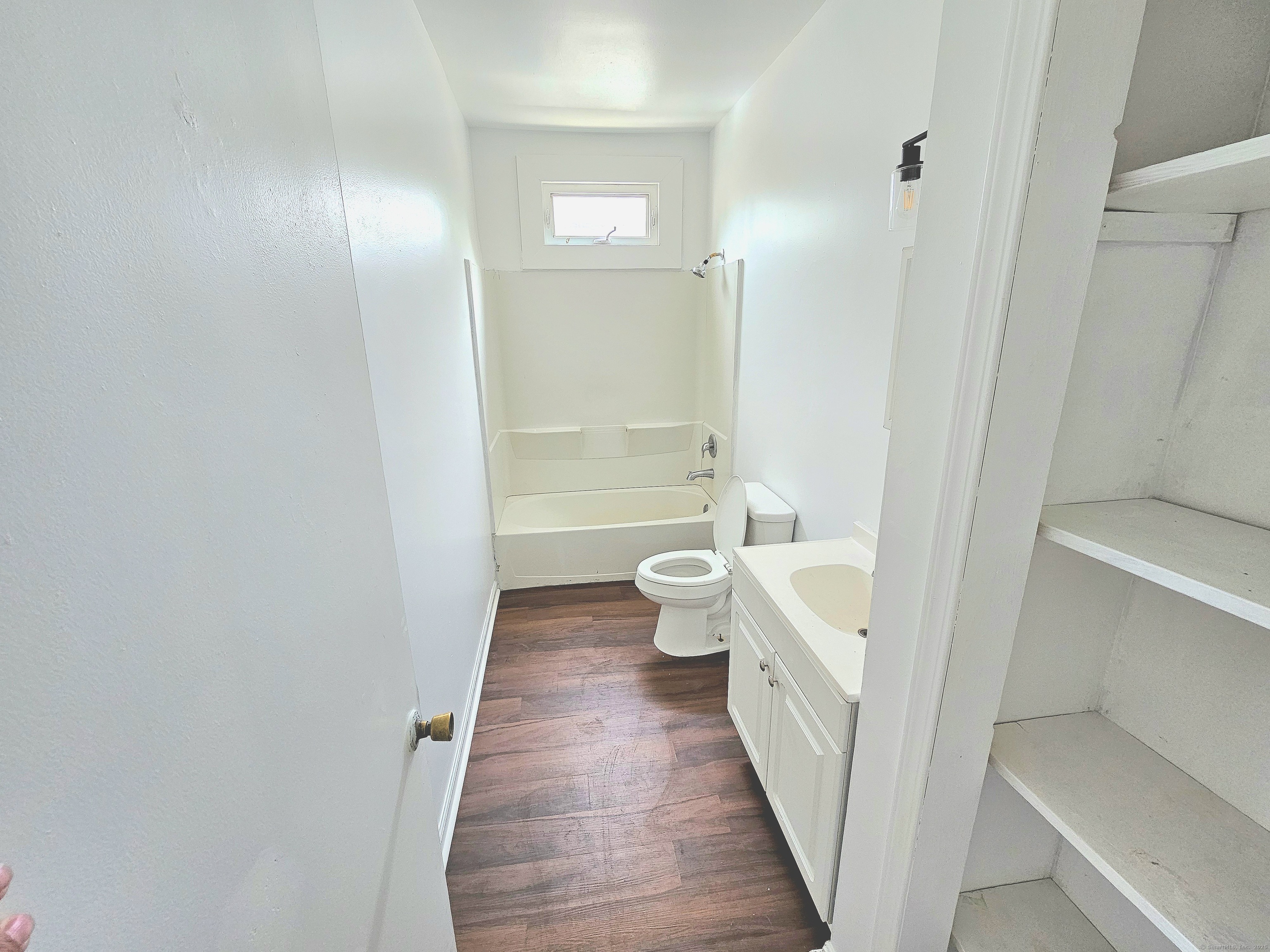 483 Ferry Street, Unit 1 New Haven, CT 06513 - Photo 8 of 8 a bathroom with a bathtub and a toilet