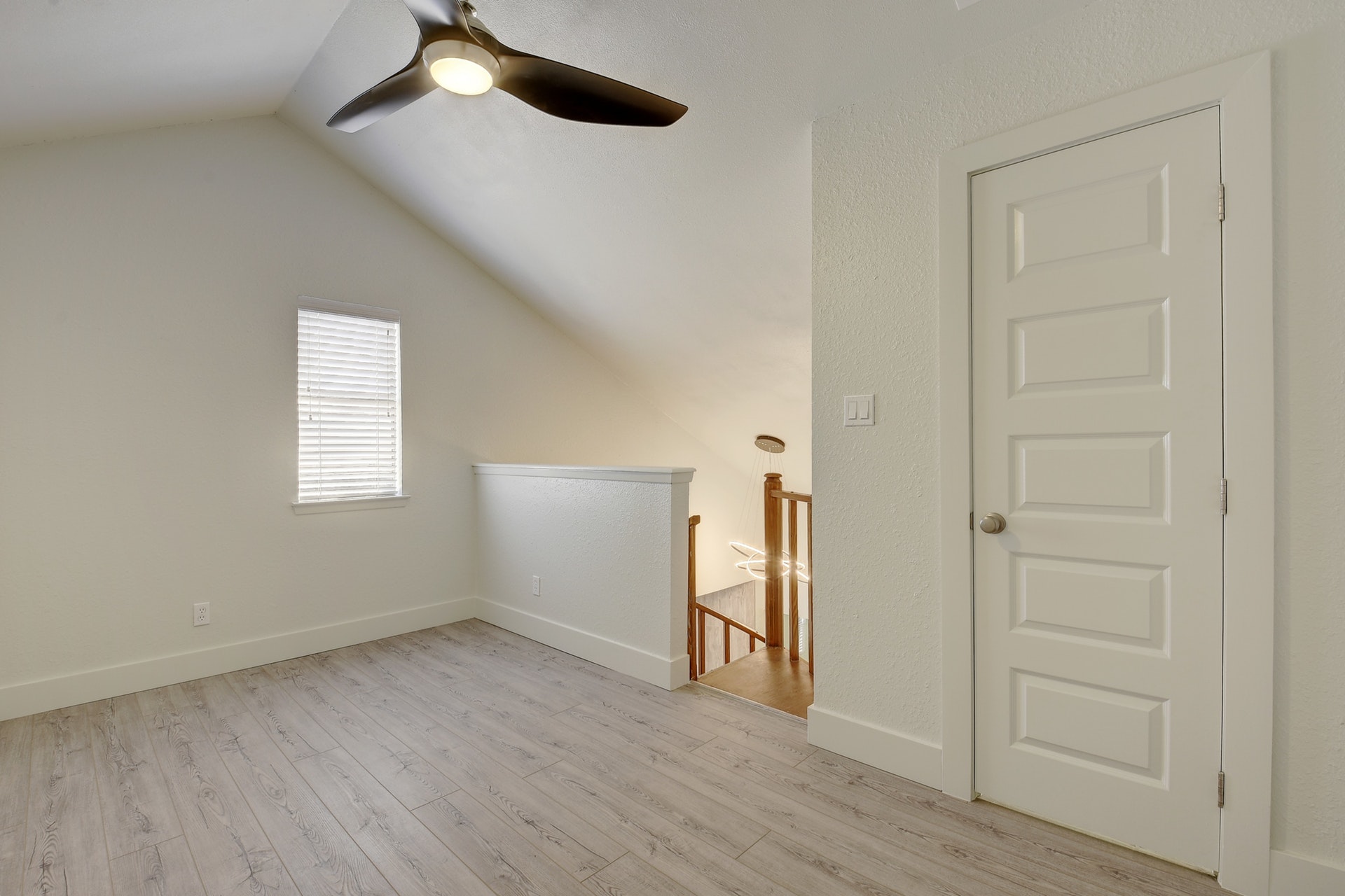 2500 Burleson Road, Unit 719 Austin, TX 78741 - Photo 14 of 22 an empty room with wooden floor closet and windows
