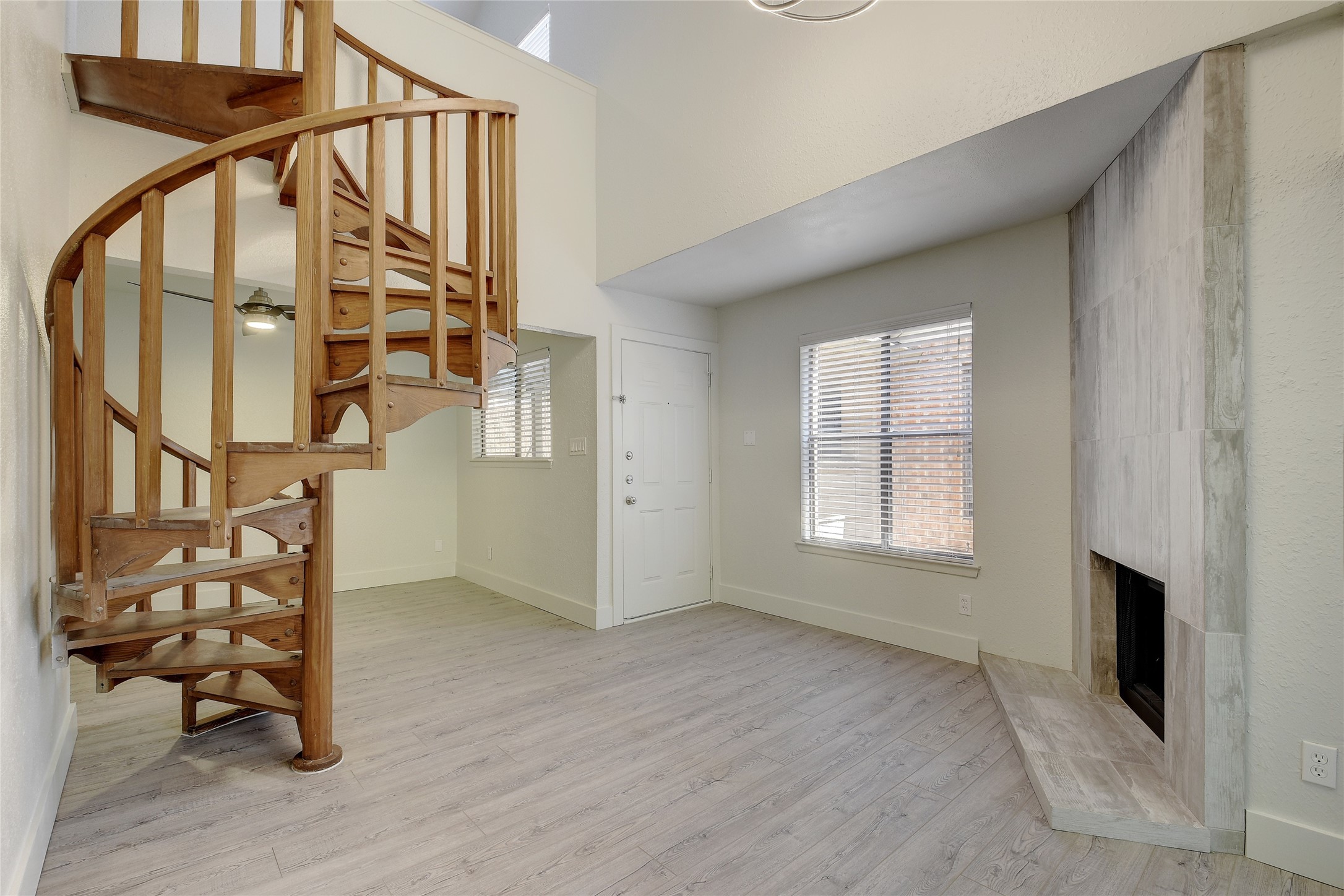 2500 Burleson Road, Unit 719 Austin, TX 78741 - Photo 2 of 22 an empty room with windows and entryway