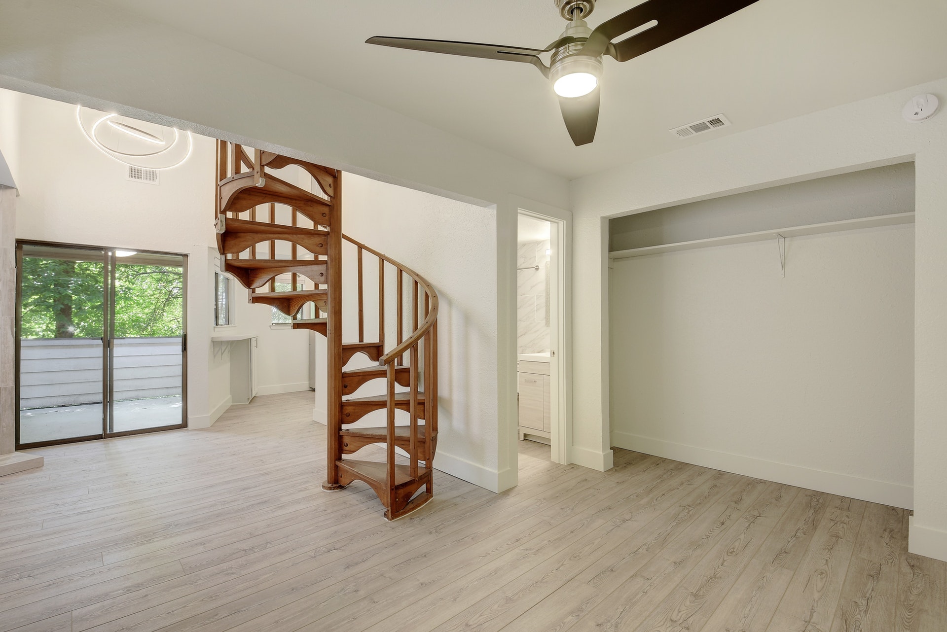 2500 Burleson Road, Unit 719 Austin, TX 78741 - Photo 6 of 22 wooden floor in an empty room with a window