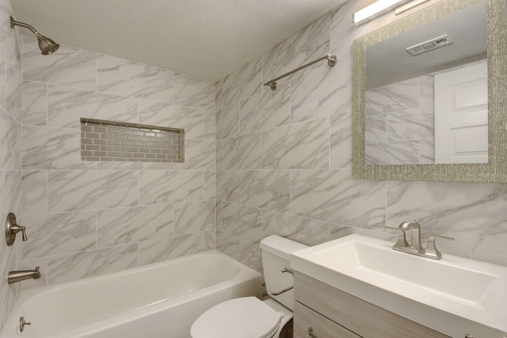 2500 Burleson Road, Unit 719 Austin, TX 78741 - Photo 9 of 22 a bathroom with a sink toilet and shower