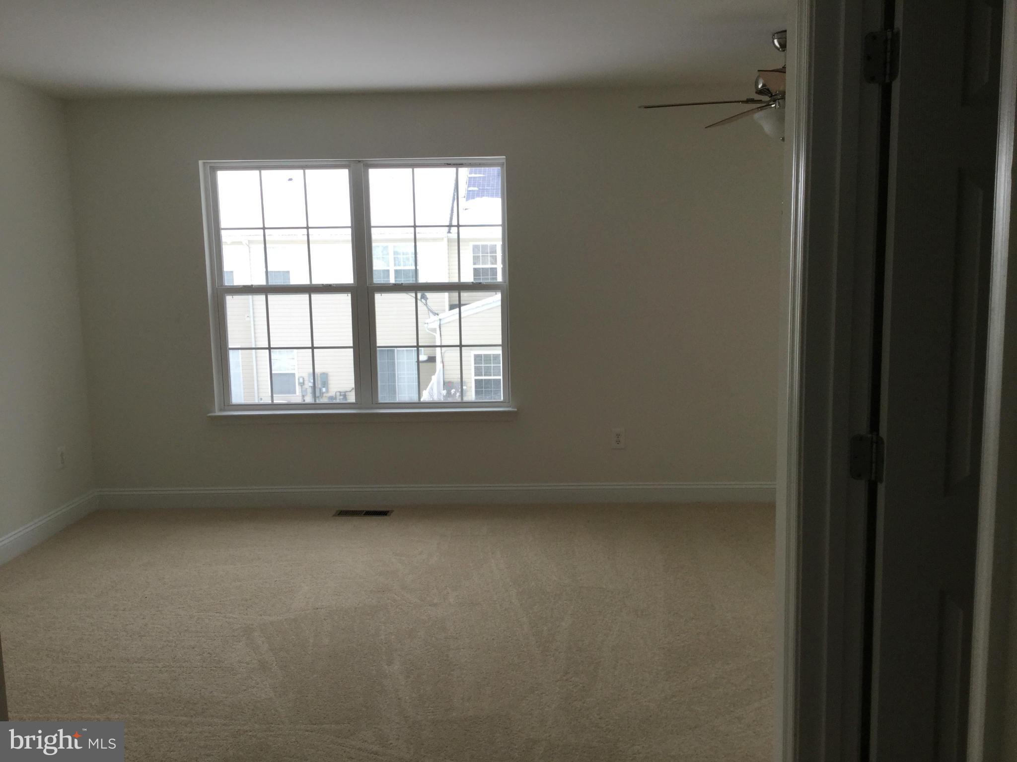 410 Ruddy Duck Court Cambridge, MD 21613 - Photo 15 of 20 Large master with ceiling fan