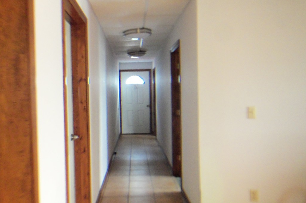 111 Anthony Fall River Fall River, MA 02721 - Photo 16 of 19 a view of a hallway with wooden floor