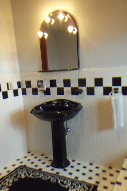 111 Anthony Fall River Fall River, MA 02721 - Photo 10 of 19 a bathroom with a sink a toilet and mirror
