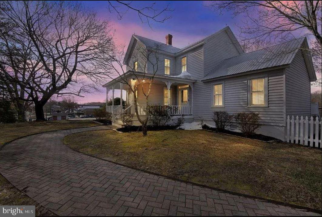 a front view of house with yard