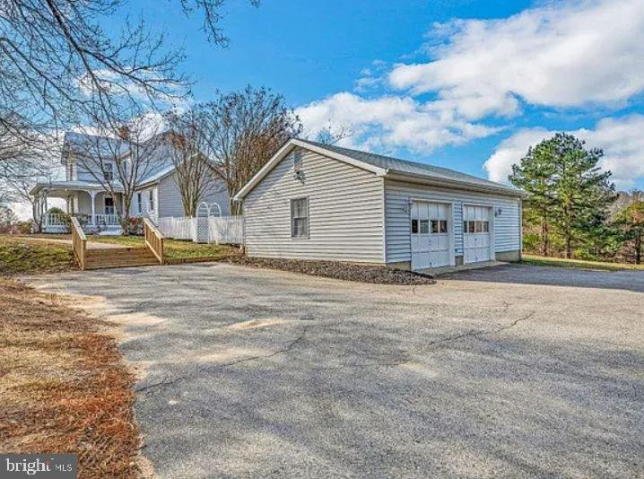 4090 Old Town Road Huntingtown, MD 20639 - Photo 12 of 42 a backyard of a house