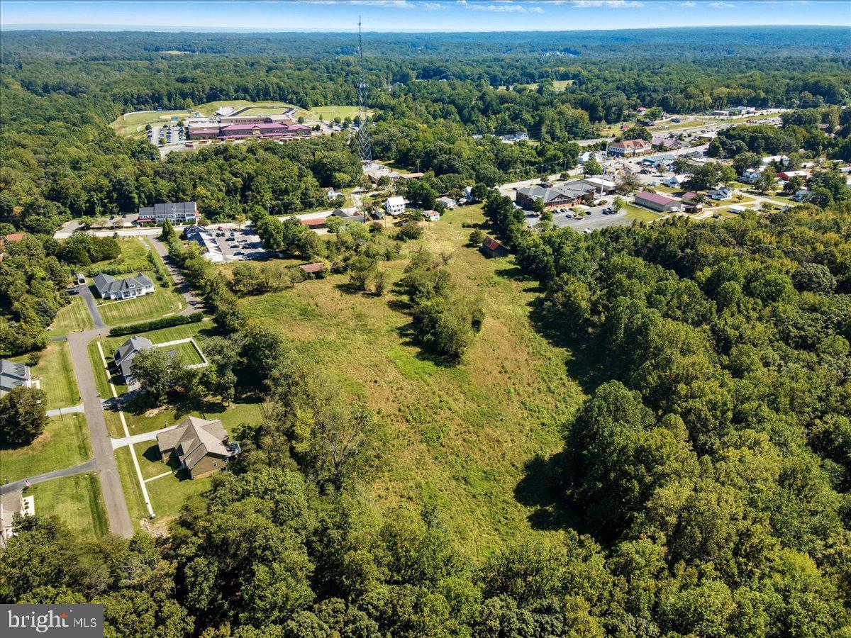 4090 Old Town Road Huntingtown, MD 20639 - Photo 20 of 42 an aerial view of residential house with outdoor space and trees