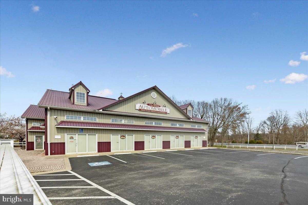 4090 Old Town Road Huntingtown, MD 20639 - Photo 35 of 42 a front view of a house with a yard