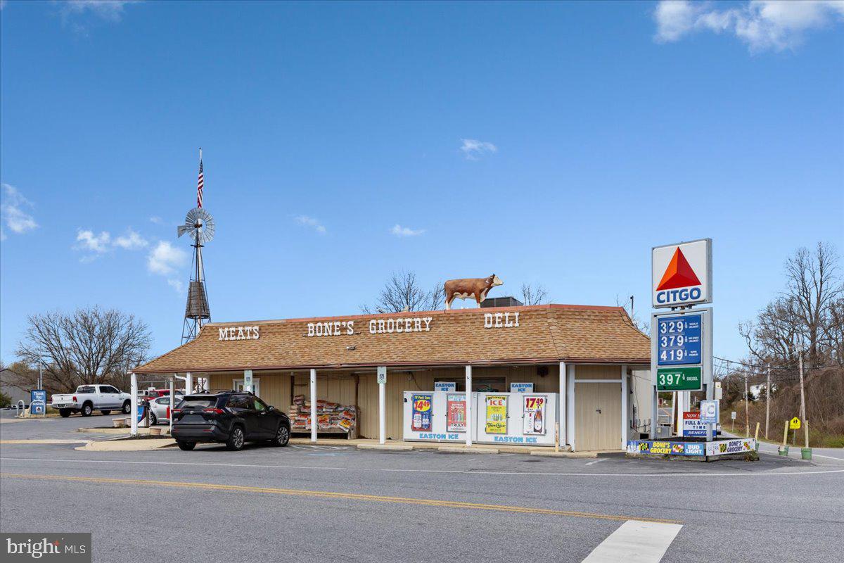 4090 Old Town Road Huntingtown, MD 20639 - Photo 41 of 42 a car parked in front of a building