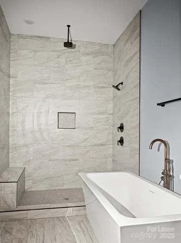 a bathroom with a sink and a shower