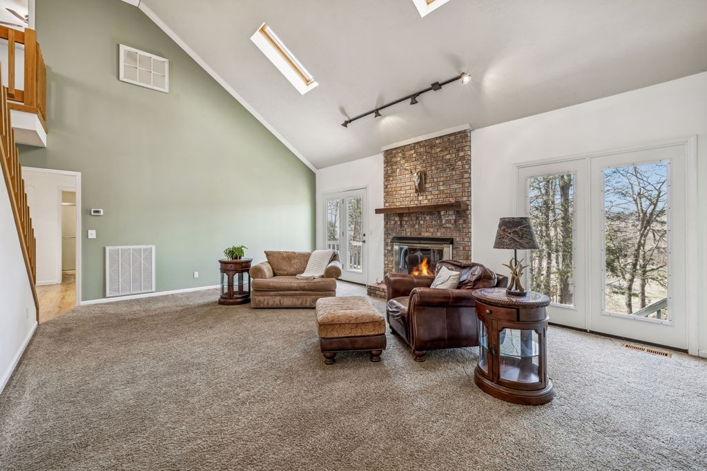 1728 Riverhaven Drive Adams, TN 37010 - Photo 11 of 75 a living room with furniture and a fireplace