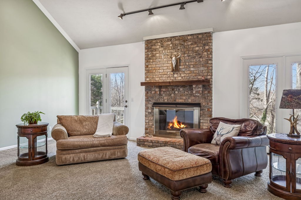 1728 Riverhaven Drive Adams, TN 37010 - Photo 12 of 75 a living room with furniture and a fireplace