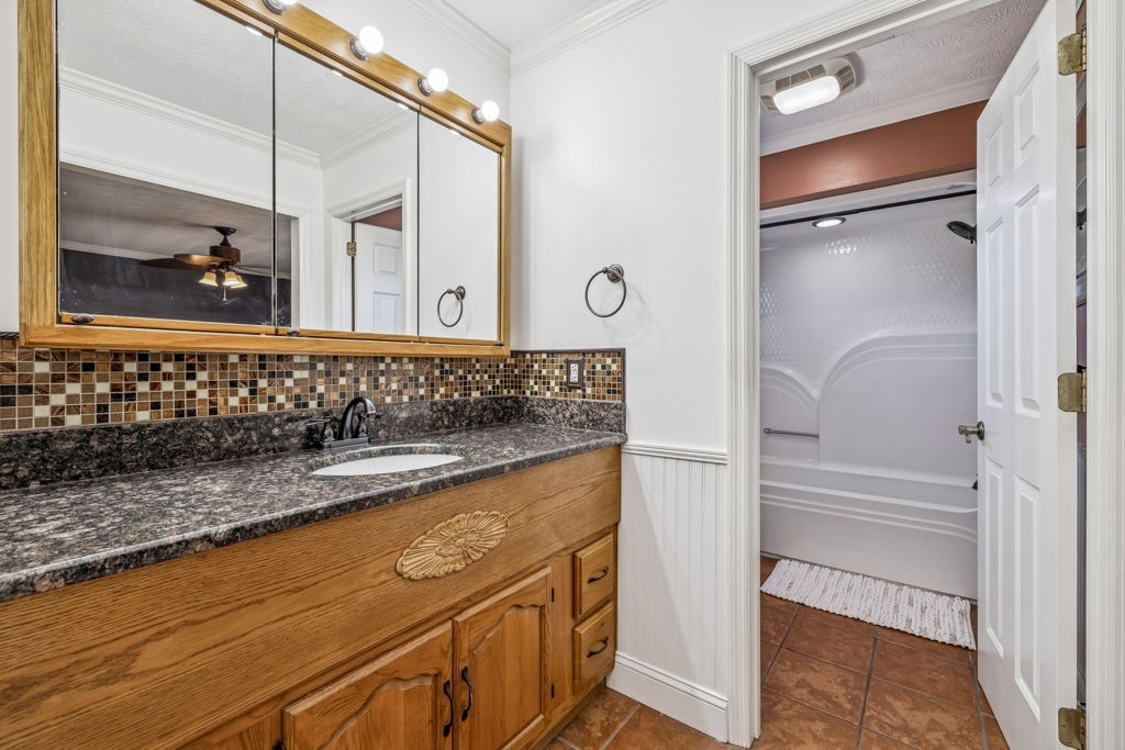 1728 Riverhaven Drive Adams, TN 37010 - Photo 19 of 75 a bathroom with a bathtub and a sink