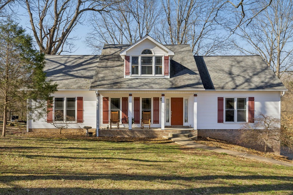 1728 Riverhaven Drive Adams, TN 37010 - Photo 2 of 75 a front view of a house with a yard
