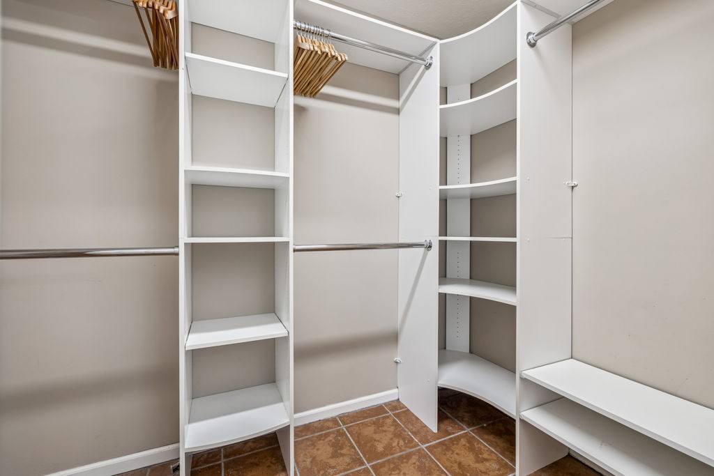 1728 Riverhaven Drive Adams, TN 37010 - Photo 21 of 75 a view of walk in closet with empty racks