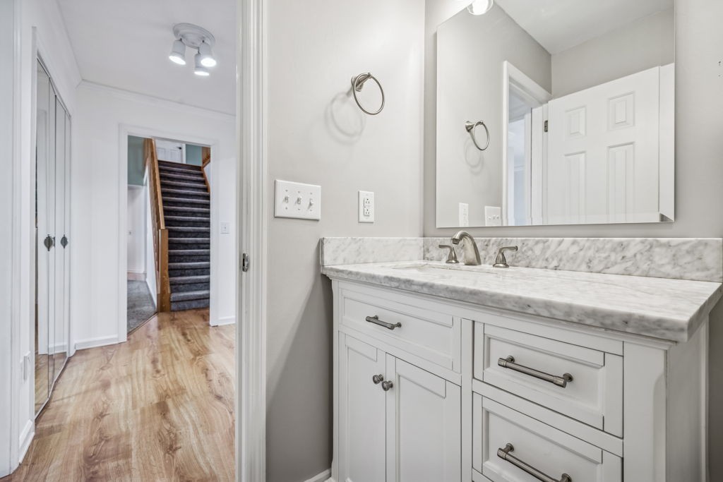 1728 Riverhaven Drive Adams, TN 37010 - Photo 34 of 75 a bathroom with a sink and a mirror