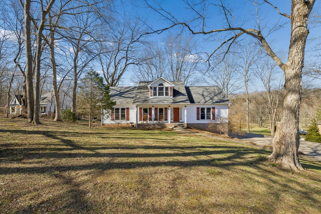 1728 Riverhaven Drive Adams, TN 37010 - Photo 4 of 75 a front view of a house with a yard