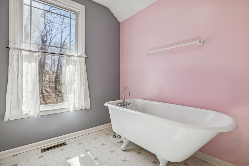 1728 Riverhaven Drive Adams, TN 37010 - Photo 42 of 75 a white bath tub sitting in a bathroom