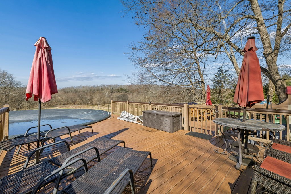 1728 Riverhaven Drive Adams, TN 37010 - Photo 52 of 75 a view of a patio with a table and chairs