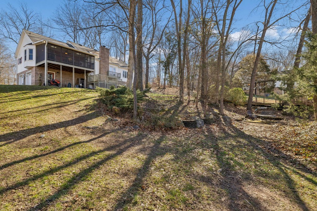 1728 Riverhaven Drive Adams, TN 37010 - Photo 53 of 75 a view of a house with a yard and sitting area