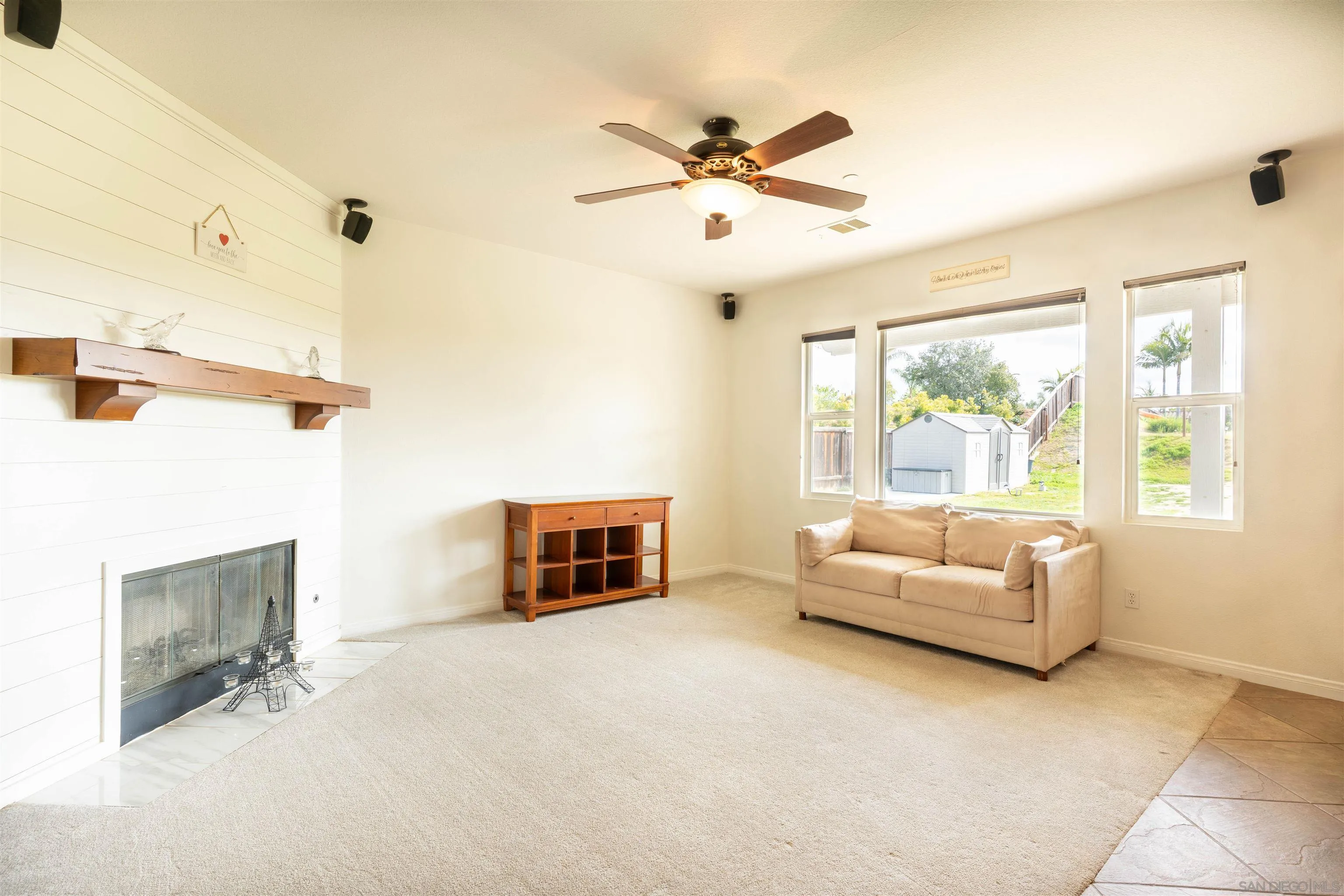 2352 Clearcrest Lane Fallbrook, CA 92028 - Photo 13 of 33 a living room with furniture and a window